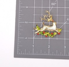 Flying Rudolph Reindeer Brooch, Gerrys brand, Gold tone enameled holly branches