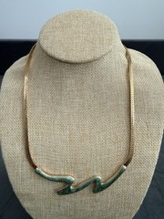 Gold tone Zig Zag Necklace With Green Stones