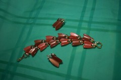 VTG. Lisner Red Thermoset Bracelet And Clip on Earrings Set