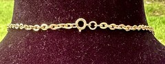 vintage-style necklace features amber-colored barrel beads and gold-tone chain
