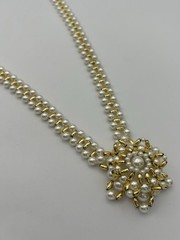 Vintage Necklace Of Gold-tone Beads With Faux Pearls And A Snowflake Pendant