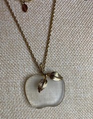Vintage Avon frosted glass apple pendant on a gold-tone chain