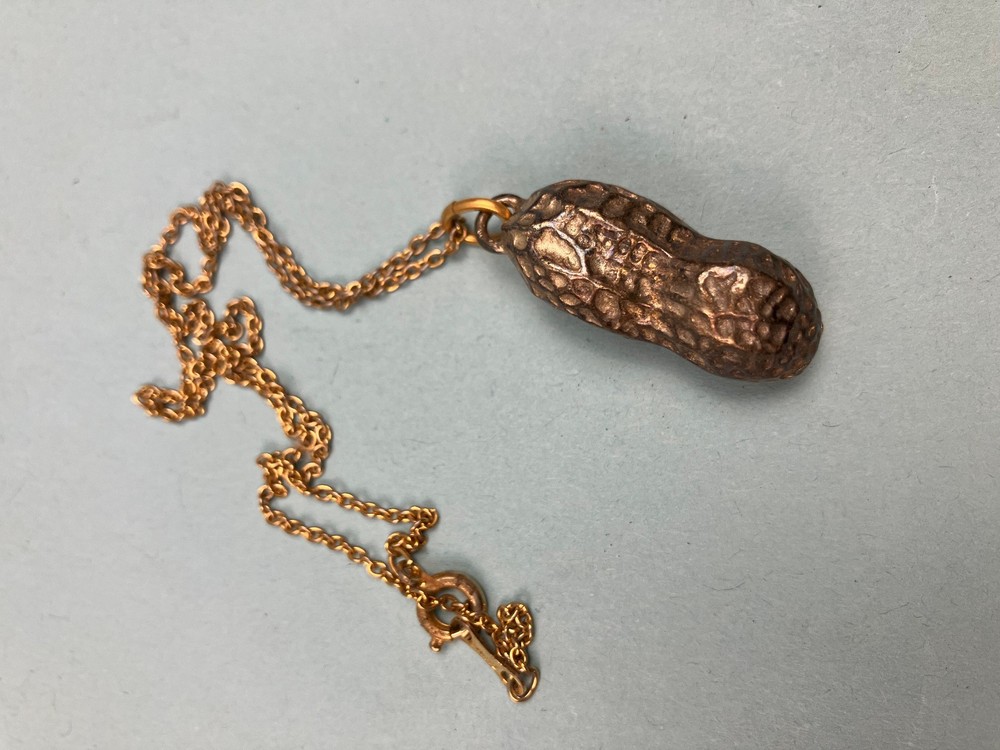 Vintage plated pewter peanut pendant in 16″ chain