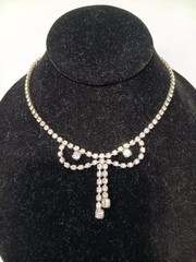 vintage 1950’s silver tone rhinestone dangle bow Tie necklace