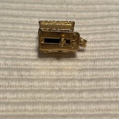 1960’s Man in Doghouse Goldtone Bracelet Charm Mechanical Signed C S Red Paint