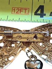 Gold-Tone Filigree Butterfly Brooch With Heart Charm 3.5 Inches Wide