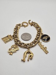 Vintage Jackie Collins Gold Tone Enamel Lady Boss Charm Bracelet Toggle Clasp