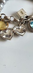 Vintage Avon Multiple Charm Silvertone Stretchable Locket Bracelet 8+