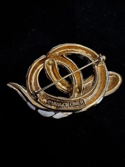 CINER FOR MMA Gold Tone Black White Enamel Coiled Snake Brooch White Rhinestones