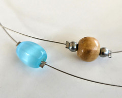 Blue Glass Wood & Acrylic Floating Bead Floating Silver Tone Necklace 17.75″ Adj