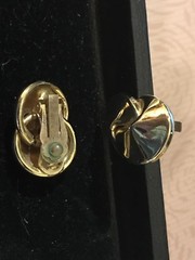 intersecting twisted discs,clip back/clip on earrings,smooth gold tone,3/4”x1”
