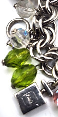 Vintage silvertone & glass charm bracelet with rare car, gold card, cell phone