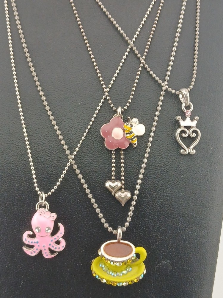 New Old Stock lot of 4 COOKIE LEE silver tone assorted figural pendant necklaces