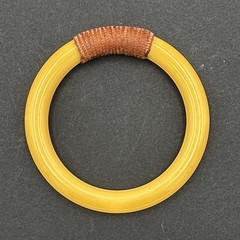 BAKELITE vintage bracelet – yellow tubular bangle w/ wrapped brown cord 8″