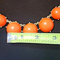 2 Statement Necklaces each 18″-20″ one Black and one Orange.