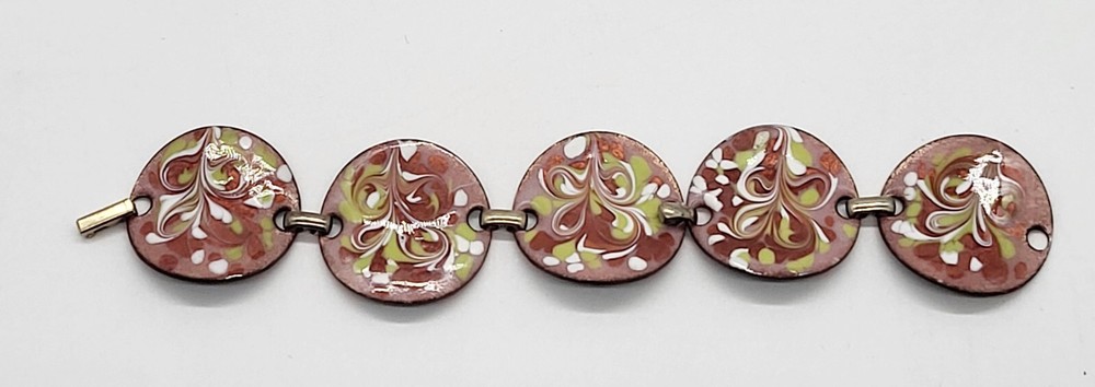 Vintage 7″ enamel on copper bracelet, round, bent sections, fold over clasp