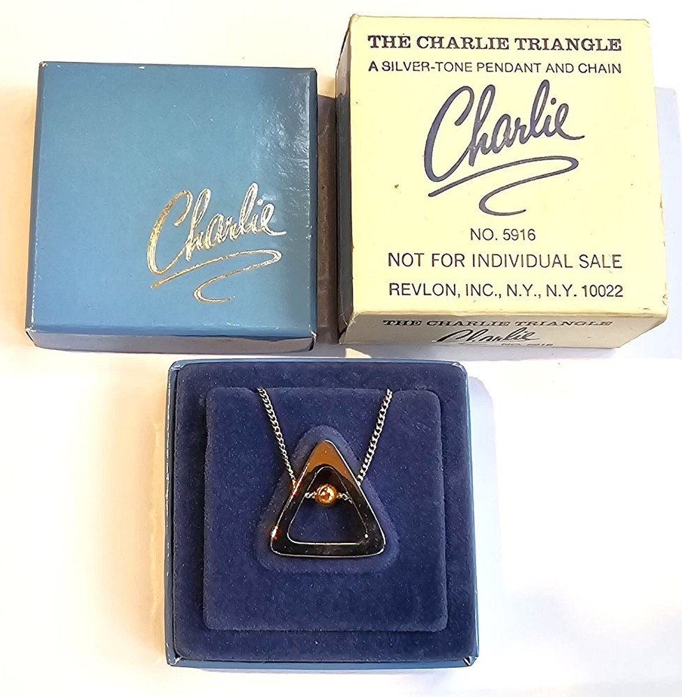 The Charlie Triangle Silver Tone Pendant Charm by Revlon Original Box Never Used