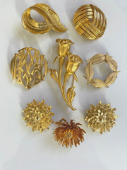 Lot of Seven Vintage Goldtone Pins + One Clip – All in Excellent Condition