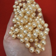 29” Faux Peach Tinted Pearls