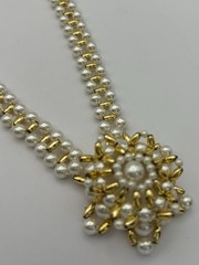 Vintage Necklace Of Gold-tone Beads With Faux Pearls And A Snowflake Pendant