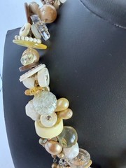 Vintage Necklace Adorned with Buttons, Beads, Buckles & Other Vintage Elements