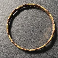 Vintage intertwined brass and copper hand-crafted bracelet from Spain