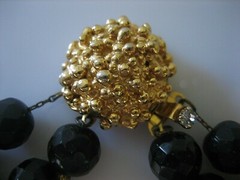 VINTAGE SIGNED MARVELLA BLACK FACETED BEAD WITH FANCY GOLD TONE CLASP NECKLACE